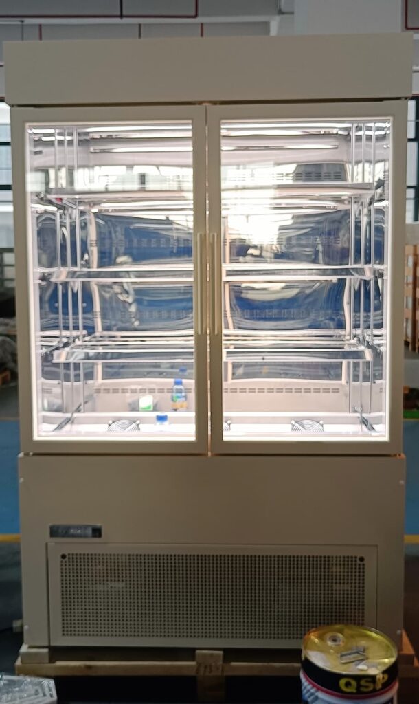 White 2 door commercial bakery display chiller in a factory on a pallet